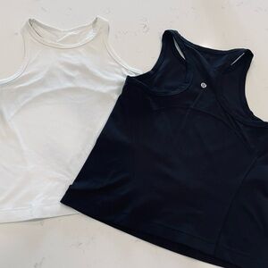 Black and white Lululemon tanks. Size S.